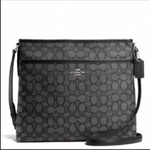 New. Coach signature file bag.